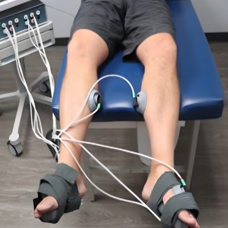 A man receiving foot treatment at Holistic Primary Care