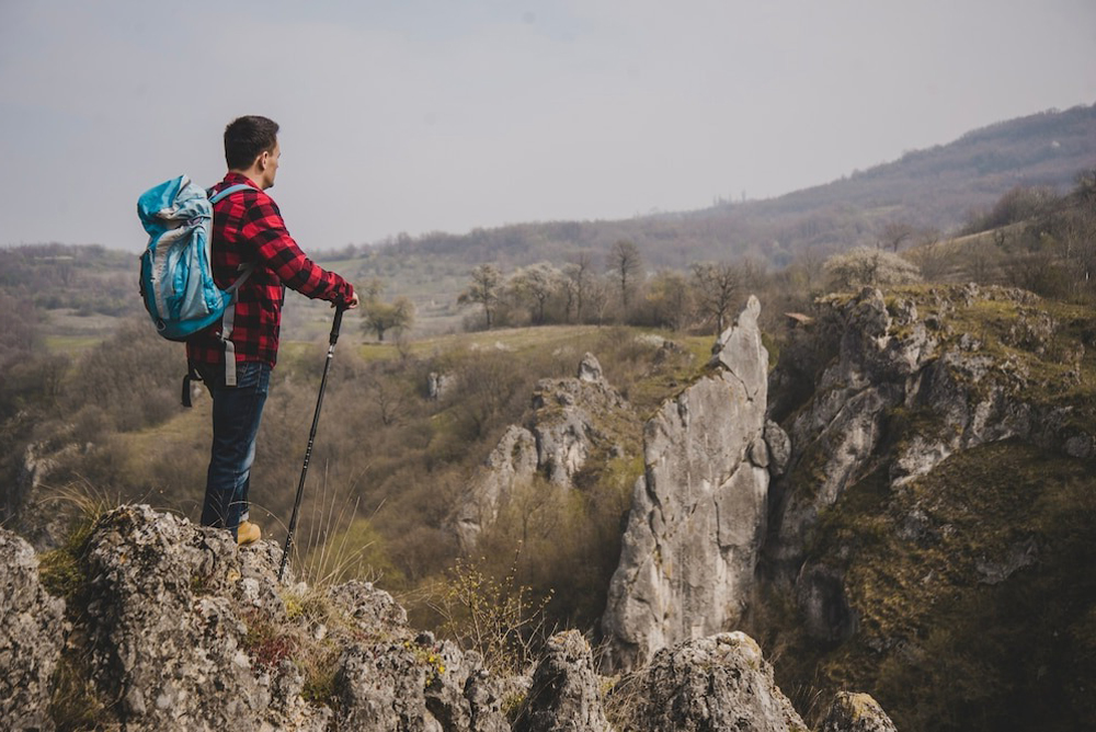 side-view-man-with-backpack-enjoying-nature