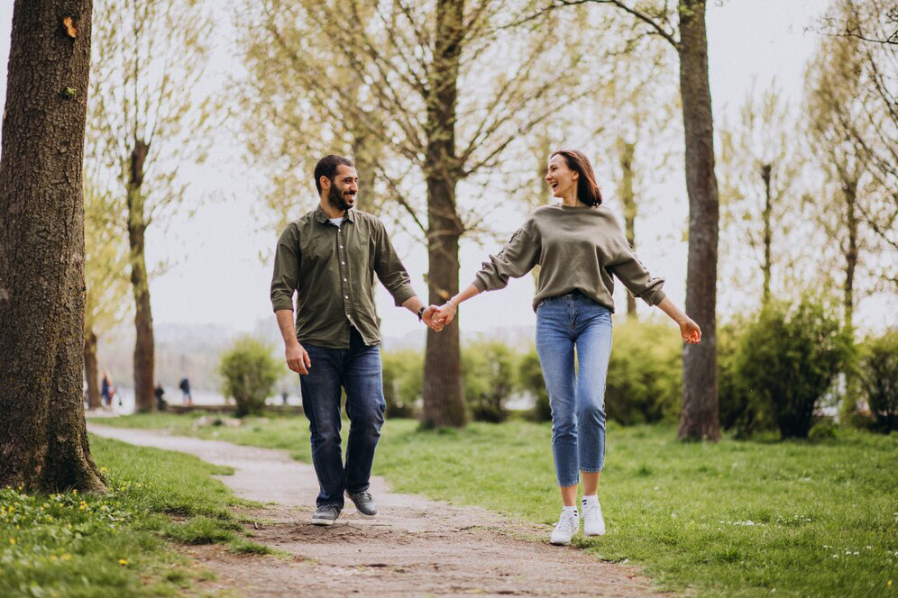 Happy Couple Walking in Nature